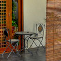 Interior Design and Build: Patio with custom-made folding doors