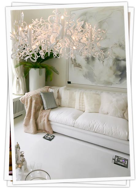 White Themed Living Room with Wall Art