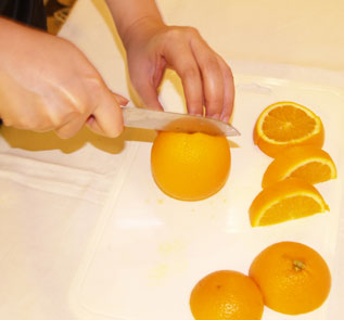 Home Decor and Handicraft: Cut orange into flat slices